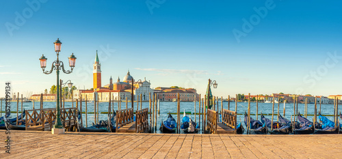 Obraz na płótnie Panorama of the Grand Canal with gondolas one of the symbols of Venice against the backdrop of San Giorgio Maggiore church at dawn, Italy. Architecture and landmark of Venice. w salonie