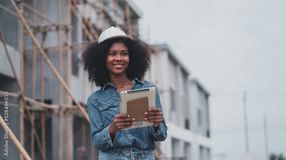 African American architects inspecting security at job sites ...