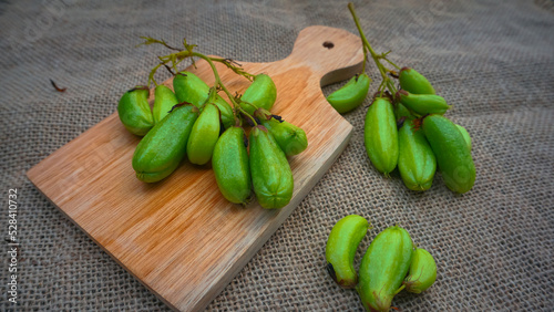 Belimbing wuluh, Vegetable starfruit or sour starfruit (Averrhoa bilimbi L.) are used as cooking spices photo