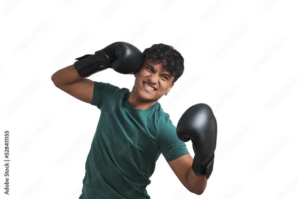 Young peruvian boxer throwing a chopping right. Isolated over white background.