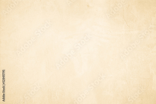 Old concrete wall texture background. Close up retro plain beige color cement material surface © Manitchaya