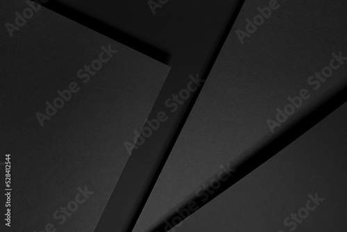 Dark grey abstract geometric background with soar rectangle spaces, stripes, lines, corners in hard light with black shadows in simple strict modern style for business card, poster, flyer, top view.