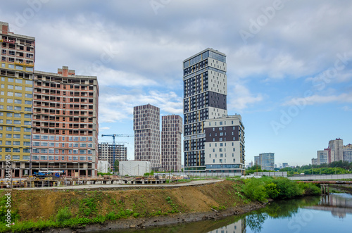 Construction of new high - rise buildings . © Сергей Лаврищев