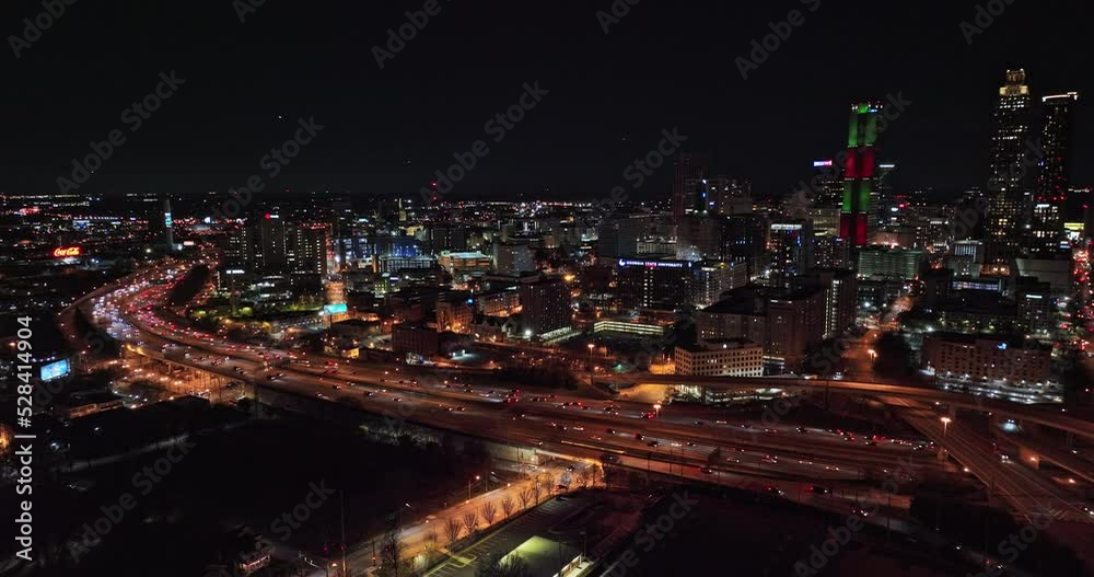 Atlanta Aerial v786 cinematic drone flyover sweet auburn neighborhood capturing freeway traffic light trails and illuminated downtown cityscape at night - Shot with Mavic 3 Cine - December 2021