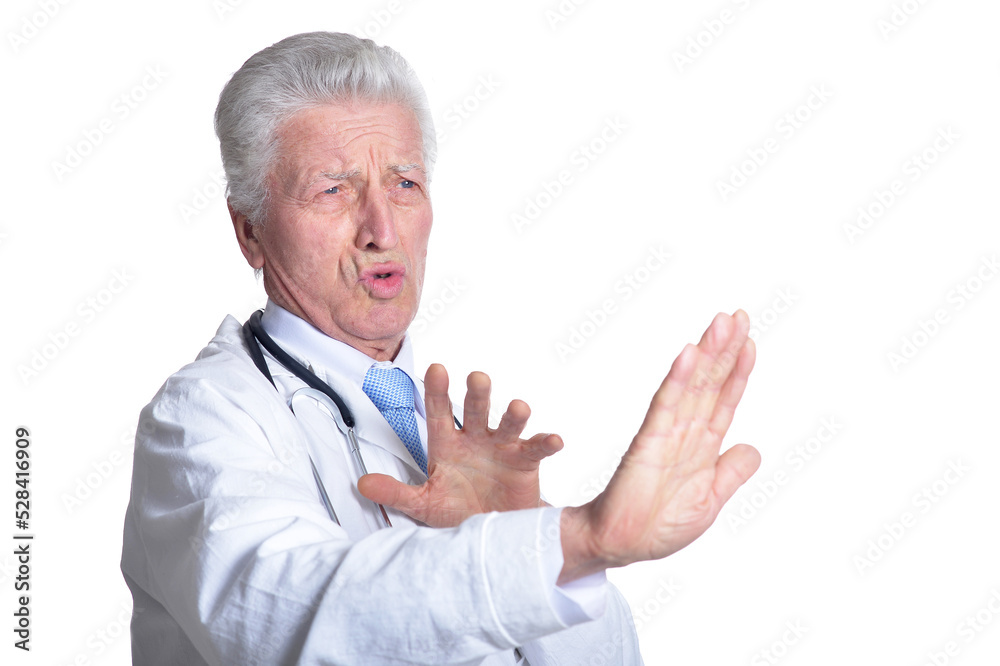 portrait of senior male doctor with stethoscope is afraid portrait of senior male doctor with stethoscope is afraid