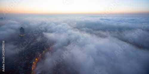 Foto Foggy aerial view of Istanbul, the Bosphorus Bridge and the city