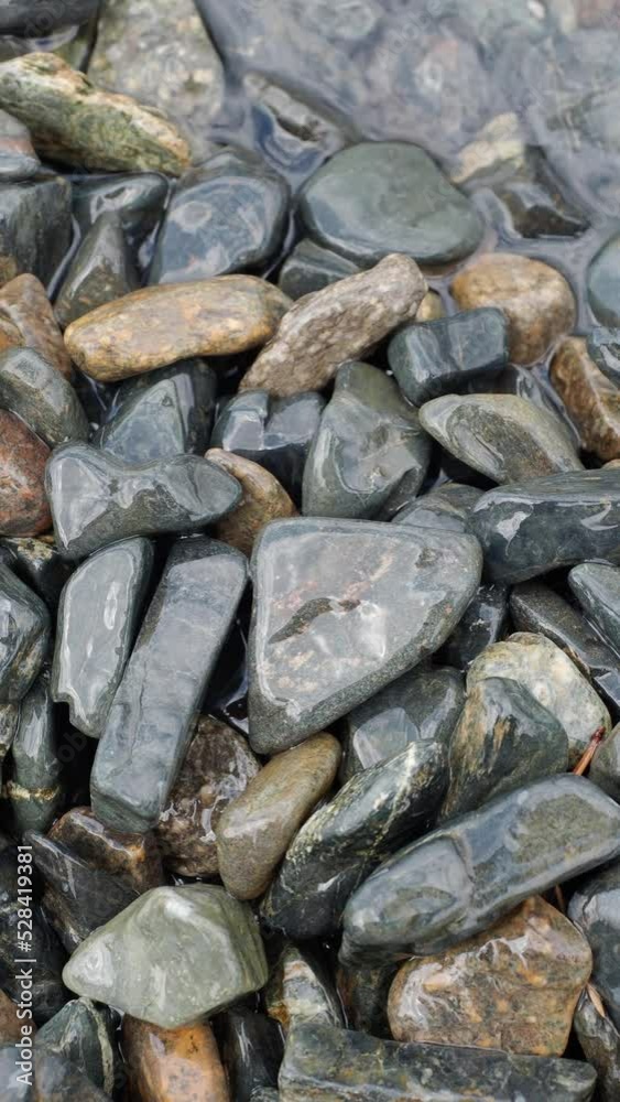 Underwater pebbles in the Lake. Clean water of the lake with pebbles on the shore Underwater pebbles in the Lake. Clean water of the lake with pebbles on the shore