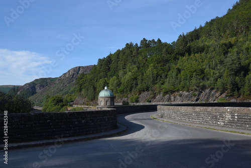 Garreg Ddu dam at elan valley during the 2022 heatwave with the water level almost low enough to see the submerged dam under the bridge