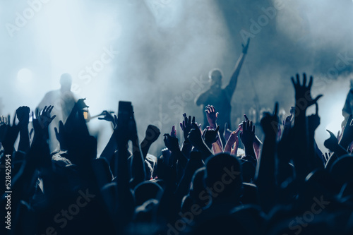 Fotografiet Concert crowd on a music concert