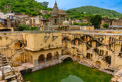 View of Panna Meena ka Kund , a Historic stepwell  rainwater catchment known for its picturesque symmetrical stairways. photo