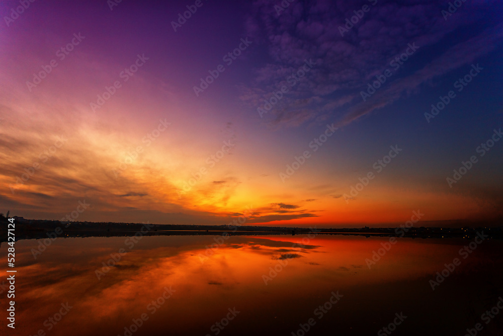 Beautiful landscape with sunset, on the lake