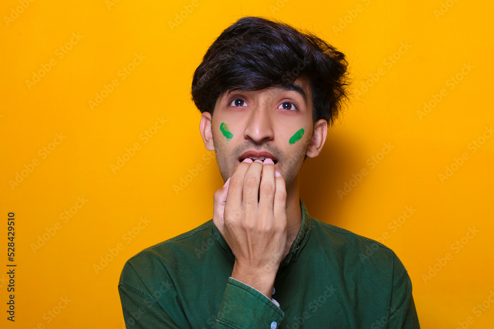 Pakistani, Indian, South Asian cricket fan is confused or sad while