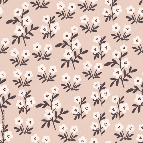 Vector hand-drawn doodle illustration of Spring or Summer flowers. Vector floral seamless pattern. Seamless wallpaper or fabric design template. © Nataliya Dolotko
