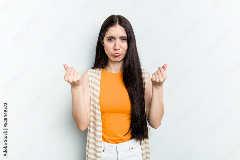 Young caucasian woman isolated on white background showing that she has no money. Young caucasian woman isolated on white background showing that she has no money.