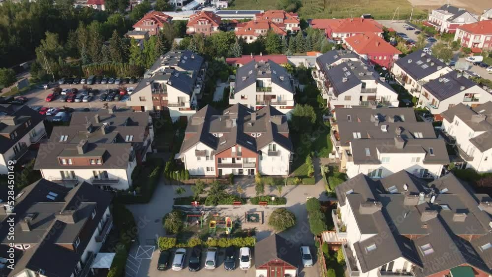 Aerial view of suburban neighborhood, Residential district with family houses in small european town, Small town in Poland, Real estate Aerial view of suburban neighborhood, Residential district with family houses in small european town, Small town in Poland, Real estate