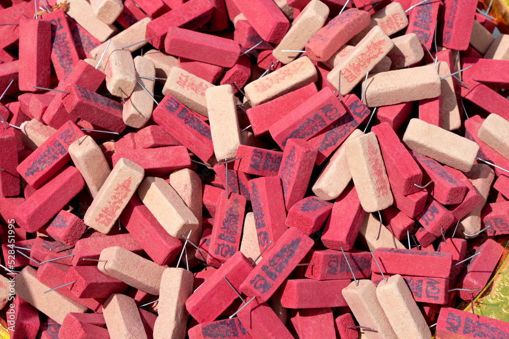 The numbers on the incense sticks dotted on the incense burner It is a