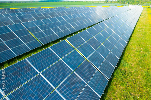 Solar panels in the green field for generation of green energy safety for environmental 
