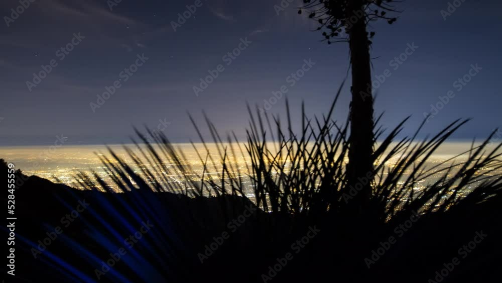 Panning Time Lapse Shot Of Sparkly City Seen From Mountain At Night - Los Angeles, California Panning Time Lapse Shot Of Sparkly City Seen From Mountain At Night - Los Angeles, California