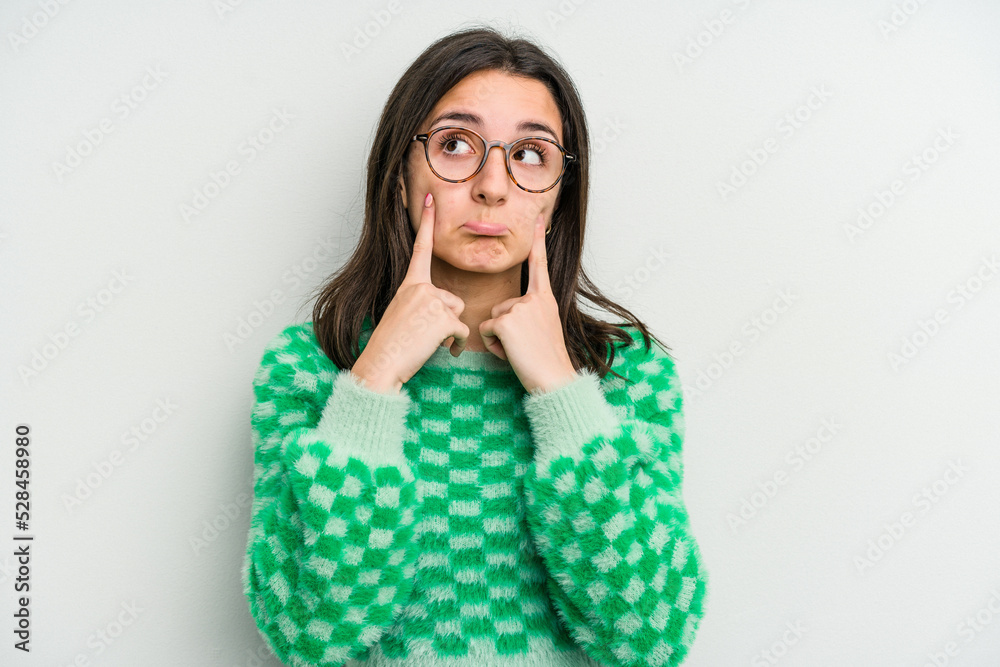 Young caucasian woman isolated on white background crying, unhappy with something, agony and confusion concept. Young caucasian woman isolated on white background crying, unhappy with something, agony and confusion concept.