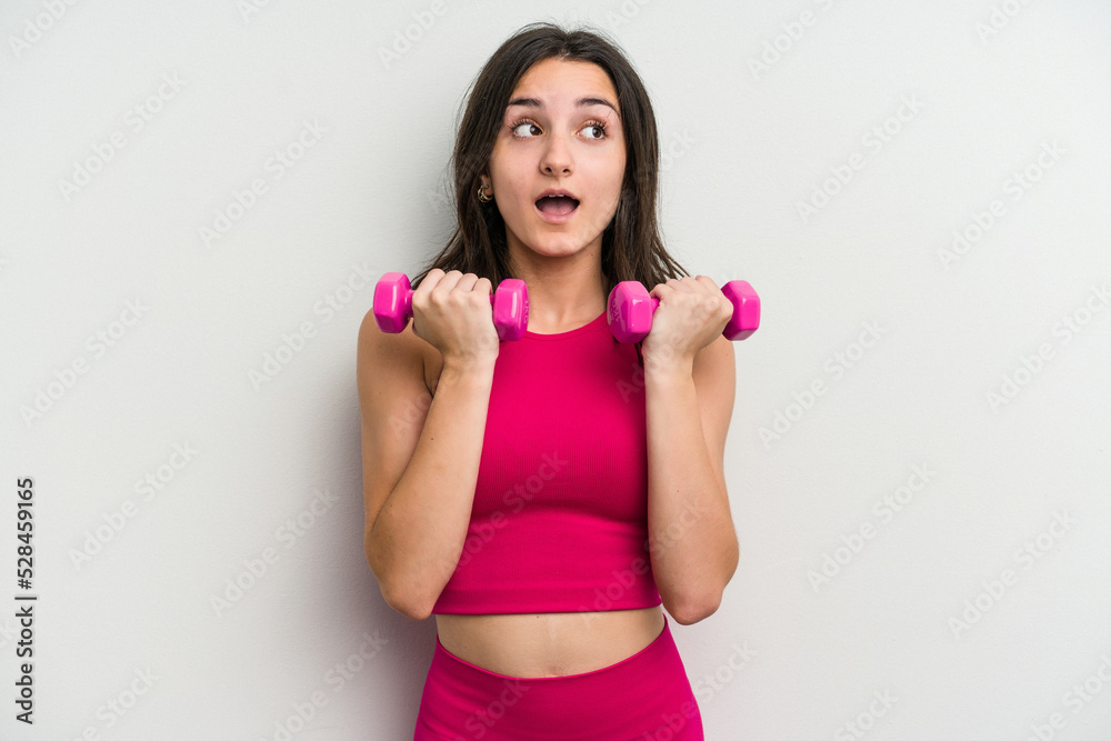 Young sport woman isolated on white background Young sport woman isolated on white background
