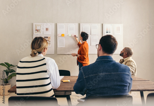 Fotografie Manager giving a presentation to her team in an office