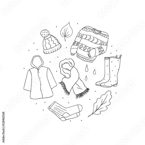 Autumn clothing set of black and white doodle elements. Vector illustration of raincoat, hat, scarf, boots, sweater and socks isolated on white background. 