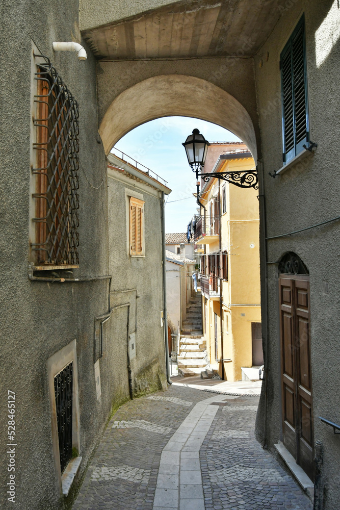 A narrow street in Castelgrande, a rural village in the province of Potenza in Basilicata, Italy.