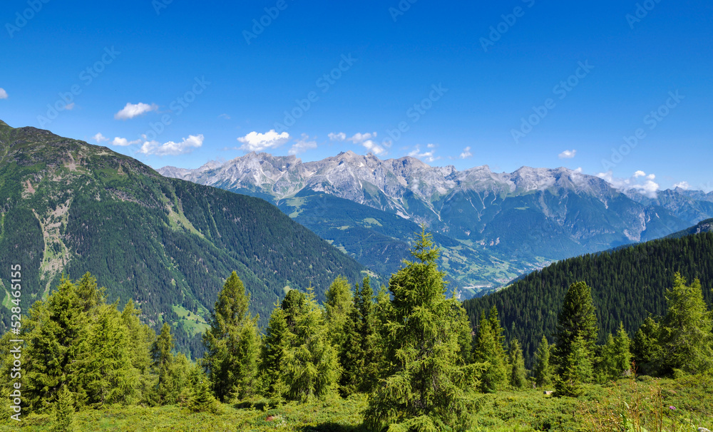 Summer landscape in mountains and blue sky with clouds. Location place Alps, Tyrol, Austria, Europe.