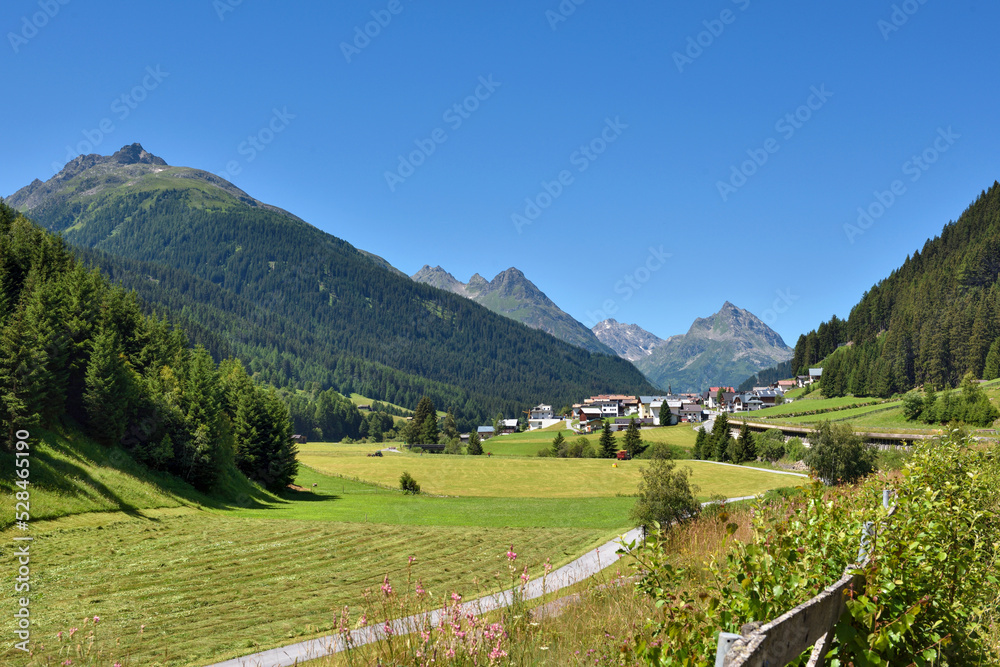 Scenic alpine town in the green mountain valley. Picturesque view in mountains. Mathon, Tyrol, Austria. Europe