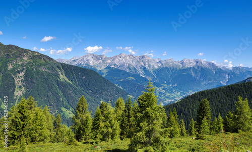 Summer landscape in mountains and blue sky with clouds. Location place Alps, Tyrol, Austria, Europe.