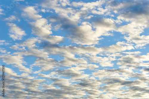 blue sky with altocumulus clouds photo