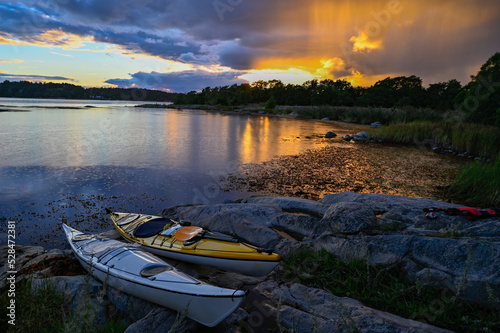 Photography sunset over kayaks a late september day Stockholm archipelago