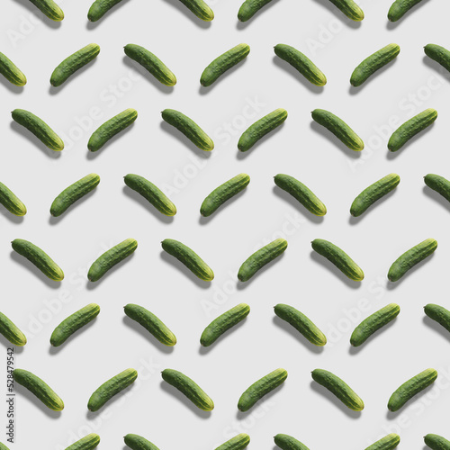  Pattern of fresh green cucumber on white background. Pop art design