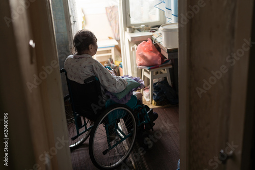 very old woman in a wheelchair