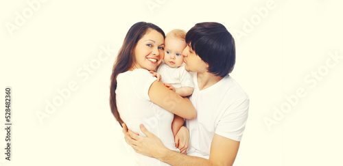 Family portrait of happy mother and father kissing baby on white background