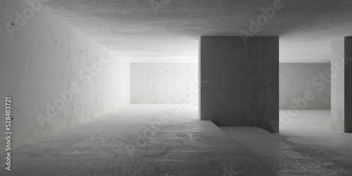 Abstract large, empty, modern concrete room with light in the back, huge pillars and rough floor - industrial interior background template