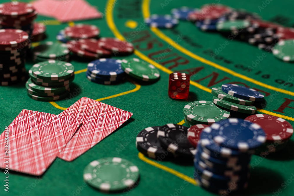Poker cloth, a deck of cards, poker hand and chips. Background Poker cloth, a deck of cards, poker hand and chips. Background