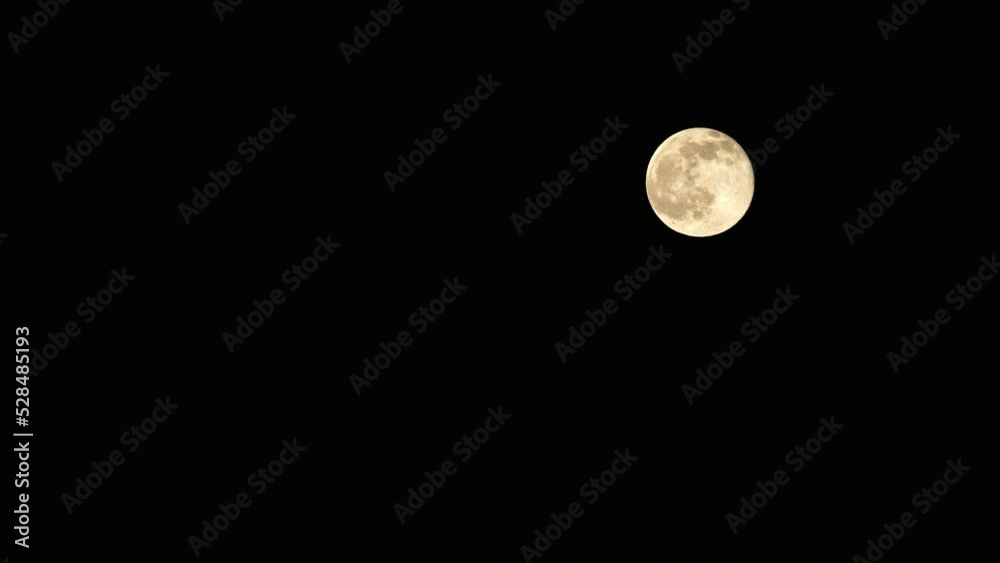 Lockdown Shot Of Bright Full Moon In Black Clear Sky - Los Angeles, California Lockdown Shot Of Bright Full Moon In Black Clear Sky - Los Angeles, California