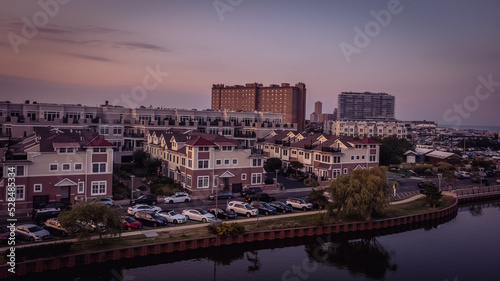 **Asbury Park Beach Homes over Ocean and InLand during Sunset."