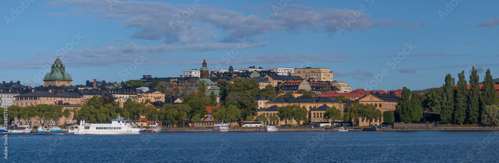 View of roofs, facades and church spires a sunny autumn day in Stockholm