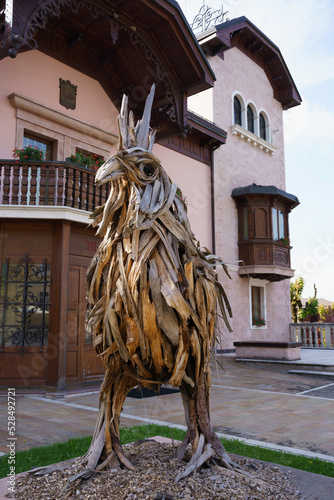 Wooden rooster at Gallio, Asiago photo