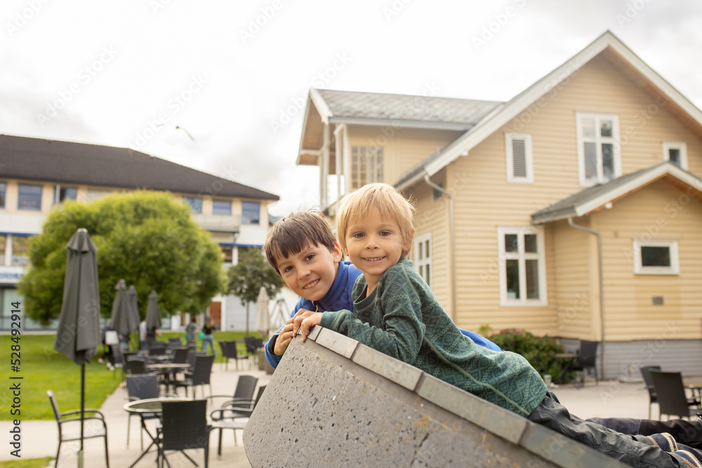 Fototapeta premium People, children enjoying the amazing views in Norway to fjords, mountains and other beautiful nature