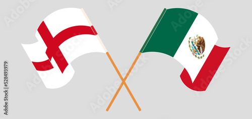 Crossed and waving flags of England and Mexico