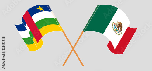 Crossed and waving flags of Central African Republic and Mexico