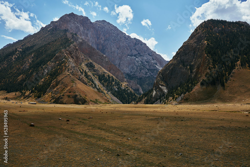 Tien Shan mountains in Kyrgyzstan #528495963