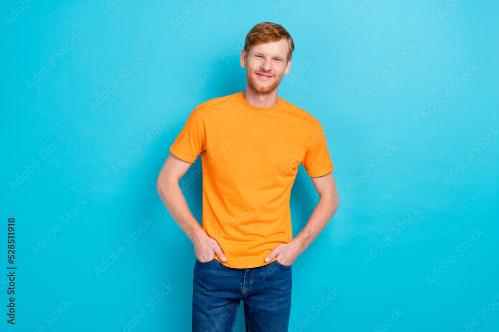 Photo of good looking satisfied man buy store center fashionable clothes outfit arms pocket isolated on aquamarine color background Photo of good looking satisfied man buy store center fashionable clothes outfit arms pocket isolated on aquamarine color background