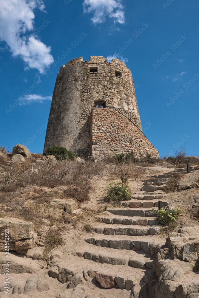 tower of barisardo beach in sardinia - italy.