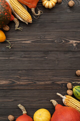 Thanksgiving vintage background with autumn harvest of squah and corn