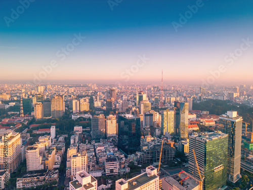 Aerial panoramic cityscape view of Ho Chi Minh city and Saigon river  Vietnam. Center of heart business at downtown with buildings and towers.