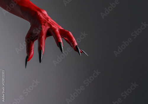 Obraz na plátně Scary female monster hands halloween character red color isolated background